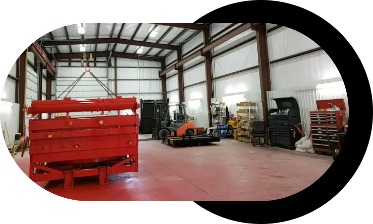 Crane Lifting Radiator In Workshop